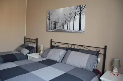 Letto o letti in una camera di beb MUFFIN