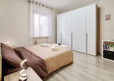 Letto o letti in una camera di Lungastretta Apartment - Cremona Center
