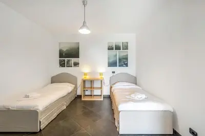 Letto o letti in una camera di Moneglia Villa in A Quiet Place - Happy Rentals