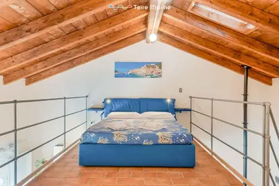 Letto o letti in una camera di Ponente, TerreMarine