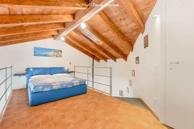 Letto o letti in una camera di Ponente, TerreMarine