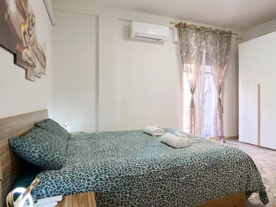Letto o letti in una camera di Dante Apartment - Cremona Center
