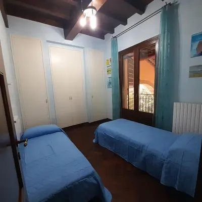 Letto o letti in una camera di Casa MoSa