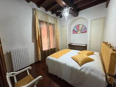 Letto o letti in una camera di Casa MoSa