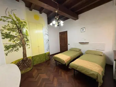 Letto o letti in una camera di Casa MoSa