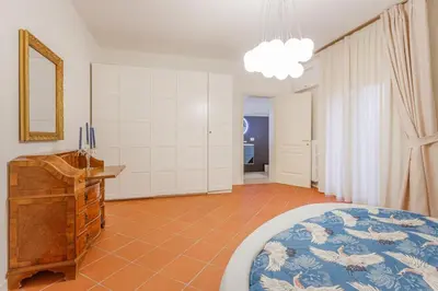 Letto o letti in una camera di Inner Garden Retreat near Ghirlandina