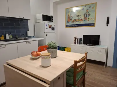 Cucina o angolo cottura di B&B La Tana del Bianconiglio