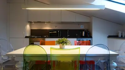 Cucina o angolo cottura di Loft Della Baia a Due Passi dal Mare