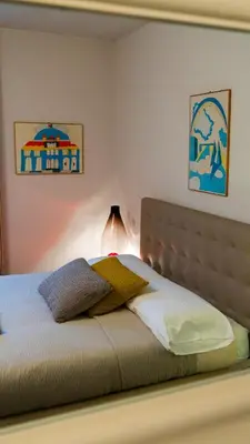 Letto o letti in una camera di Loft Della Baia a Due Passi dal Mare