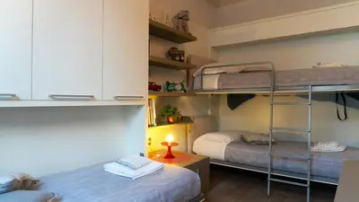 Letto o letti in una camera di Loft Della Baia a Due Passi dal Mare