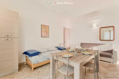Letto o letti in una camera di La Corte dei ValEmi 2-3, TerreMarine