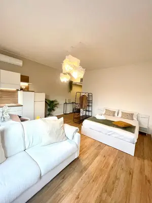 Letto o letti in una camera di MiA MARiA MARGAUX