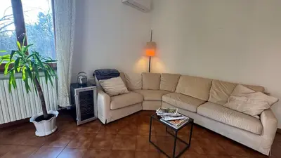 Area soggiorno di Tamburini 38 Vintage Apartment Near City Center, Parking Included