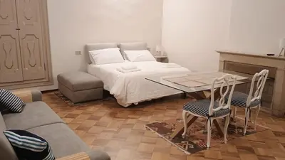 Letto o letti in una camera di FuoriPorta Affitti Brevi - L'Appartamento della Musica
