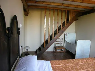 Letto o letti in una camera di Agriturismo Bosco Del Fracasso
