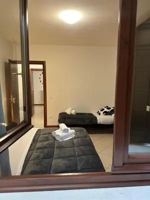 Letto o letti in una camera di SognaRE appartament