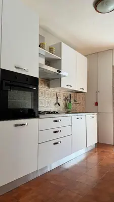 Cucina o angolo cottura di Emilia Tre camera in appartamento bagno privato