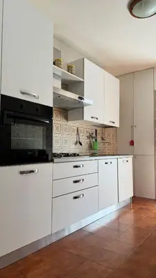 Cucina o angolo cottura di Emilia Tre camera in appartamento bagno privato