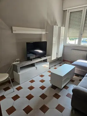 TV o dispositivi per l'intrattenimento presso Appartamento vicino lo stadio con garage