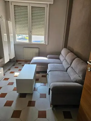 Area soggiorno di Appartamento vicino lo stadio con garage