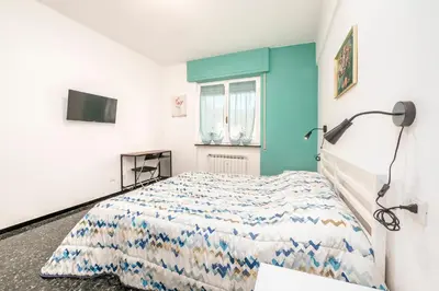 Letto o letti in una camera di 321 - Cà du Felisottu, Centro di Sestri a 500metri dalla Baia del Silenzio