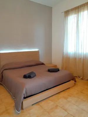 Letto o letti in una camera di Seven B&b