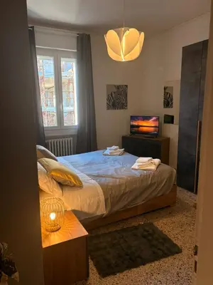 Letto o letti in una camera di GuestHouse Modena Buon Pastore