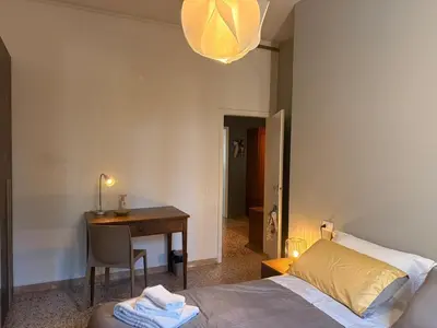 Letto o letti in una camera di GuestHouse Modena Buon Pastore