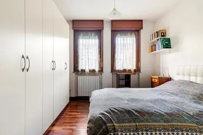 Letto o letti in una camera di Cremona Stadium & Culture