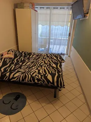 Letto o letti in una camera di Via del corso