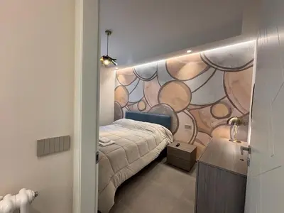 Letto o letti in una camera di Casa Giovanni by Holiday World