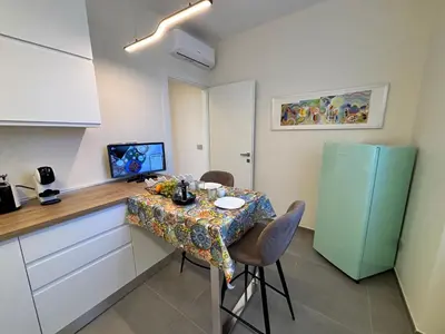 Cucina o angolo cottura di Casa Giovanni by Holiday World