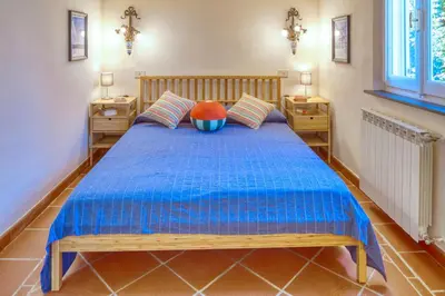 Letto o letti in una camera di PORTOVECCHIO Extra