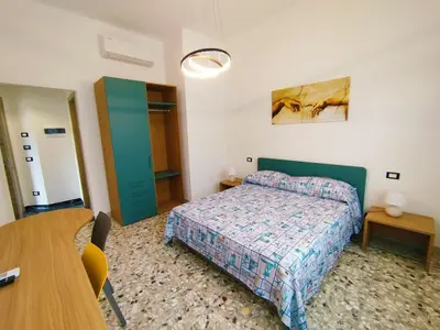 Letto o letti in una camera di VILLA All'ombra del Cedro