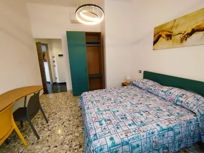 Letto o letti in una camera di VILLA All'ombra del Cedro