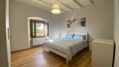 Letto o letti in una camera di Appartamento indipendente apt 1
