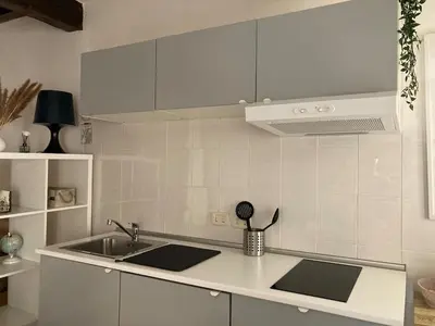 Cucina o angolo cottura di Delizioso monolocale nel centro storico di Modena