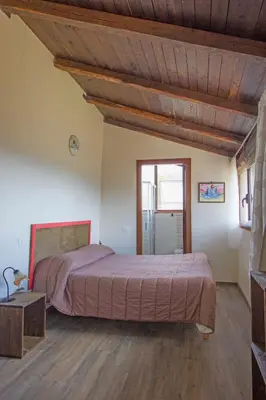 Letto o letti in una camera di Agripodere il Falco - Tuscany Exclusive Retreat & Villa