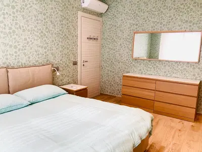 Letto o letti in una camera di Modern 90sqm Apt - Ideal Base for Parma & Modena