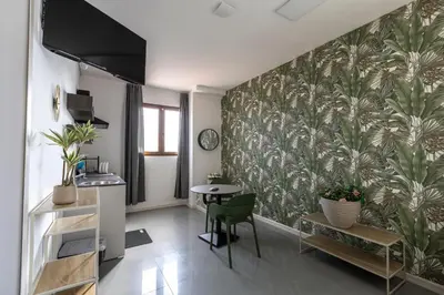 TV o dispositivi per l'intrattenimento presso Foresteria SMART ROOMS