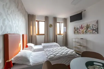 Letto o letti in una camera di Foresteria SMART ROOMS