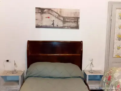 Letto o letti in una camera di Apartment Wohnung mit zauberhaftem Blick auf das Schloss by Interhome