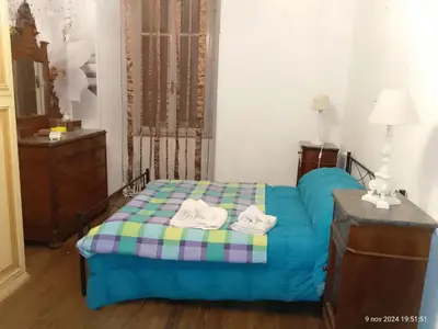 Letto o letti in una camera di Apartment Wohnung mit zauberhaftem Blick auf das Schloss by Interhome