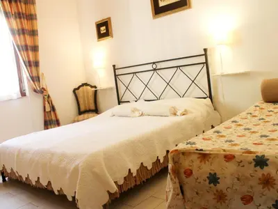 Letto o letti in una camera di Apartment Sehr zentral mit Parkmöglichkeit by Interhome