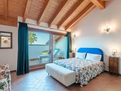 Letto o letti in una camera di Apartment Penthouse - Doppelbett und Doppelschlafcouch by Interhome