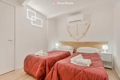 Letto o letti in una camera di Cà Maccaja, TerreMarine
