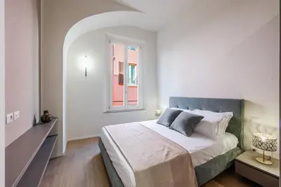 Letto o letti in una camera di L'Antico Moderno Boutique Apartment