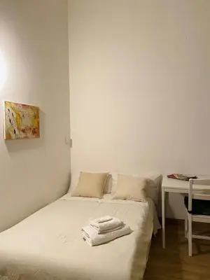 Letto o letti in una camera di Casa Parma