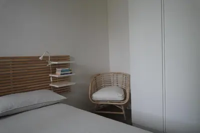 Letto o letti in una camera di Appartamento Corte dei magazzini