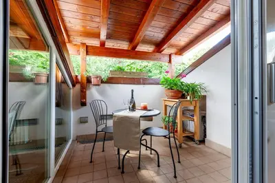 Balcone o terrazza di Romantica mansarda con terrazzino sui tetti di Parma